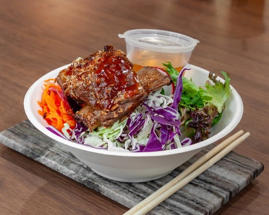 Twice-cooked brisket beef served with shredded cabbage, pickle, radish, cucumber, herbs, fried shallot, peanut, chilli, and sweet and sour fish sauce.